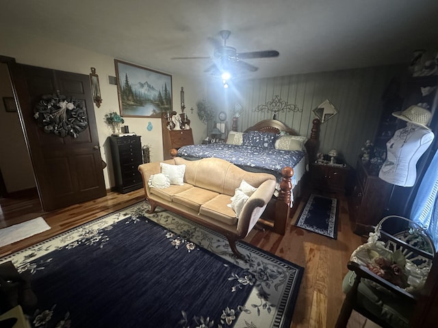 bedroom featuring wood-type flooring and ceiling fan