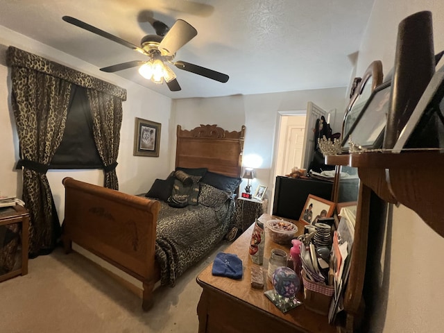 bedroom with light colored carpet and ceiling fan