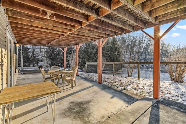 view of snow covered patio