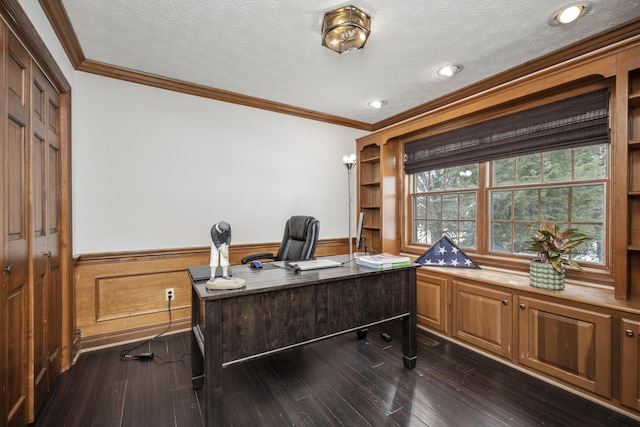 office area with ornamental molding, dark hardwood / wood-style floors, and a textured ceiling