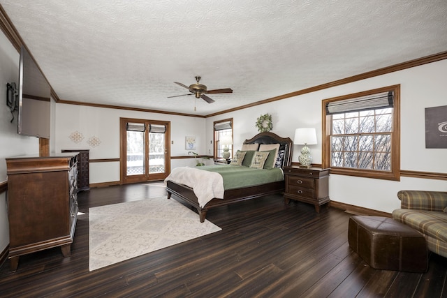 bedroom with ceiling fan, dark hardwood / wood-style floors, and a textured ceiling