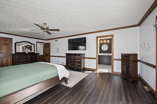 bedroom featuring connected bathroom, crown molding, a textured ceiling, and ceiling fan