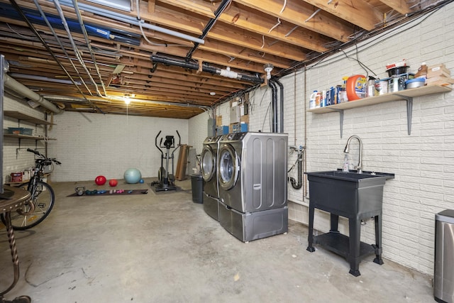 basement with washing machine and dryer