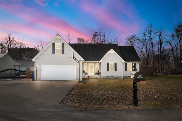 view of front of house with a garage