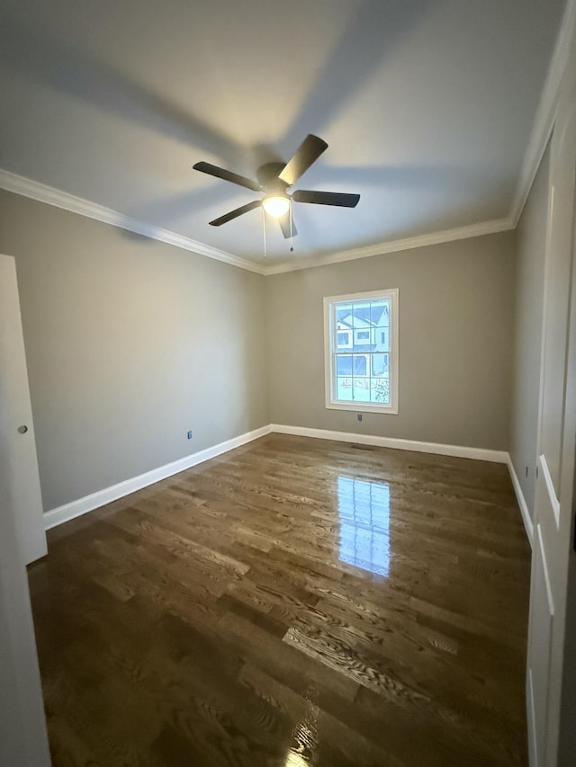 unfurnished room with ceiling fan, crown molding, and dark hardwood / wood-style flooring