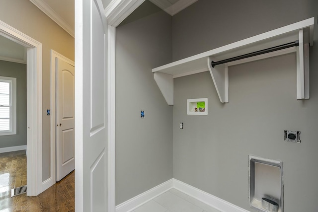 laundry room with hookup for a washing machine, crown molding, and hookup for an electric dryer