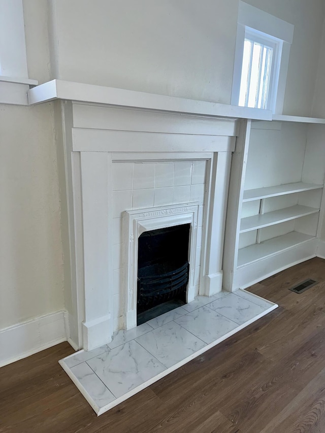 interior details featuring hardwood / wood-style floors