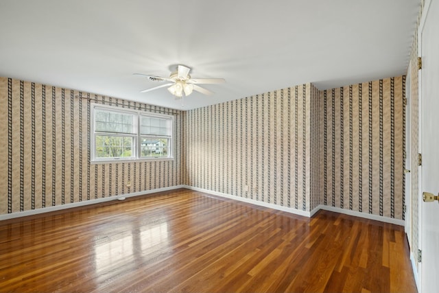 unfurnished bedroom with wood-type flooring and ceiling fan