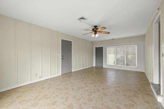 empty room with ceiling fan