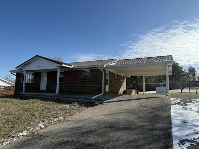 view of front of house featuring a carport