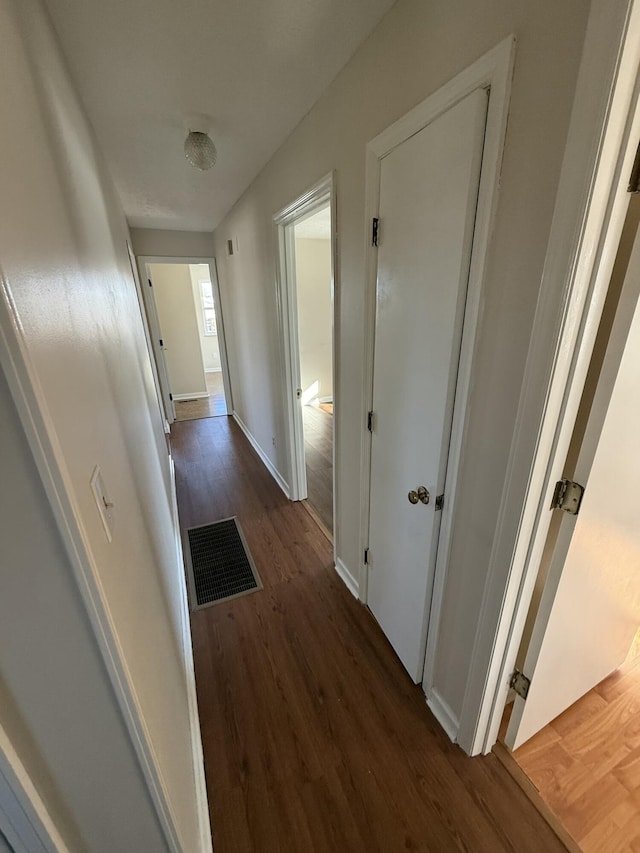 hall featuring dark hardwood / wood-style flooring