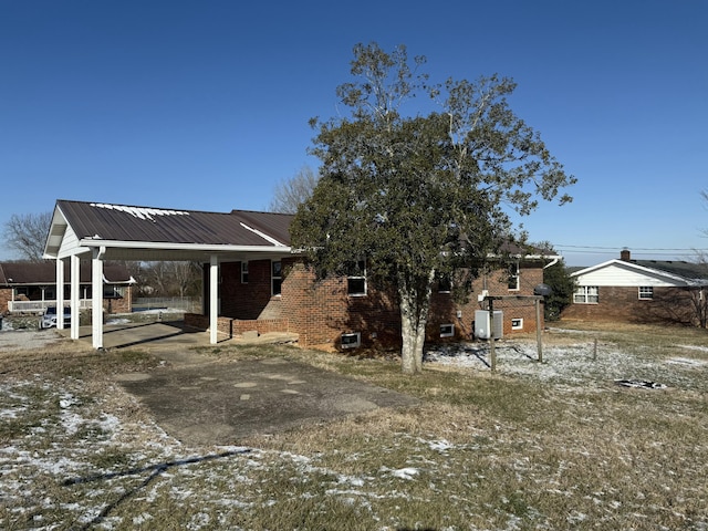 view of snow covered house