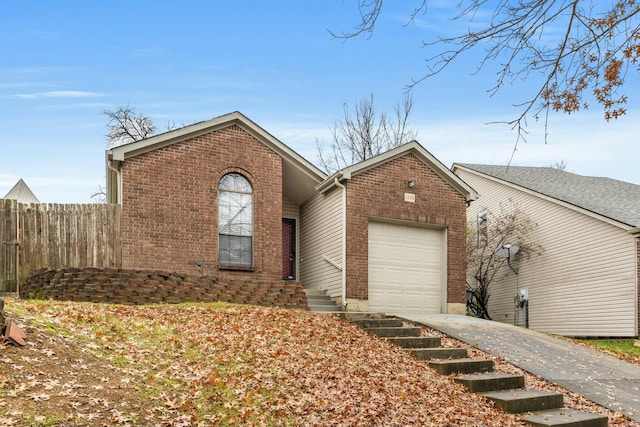 view of front of property with a garage