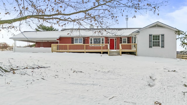 view of snow covered property