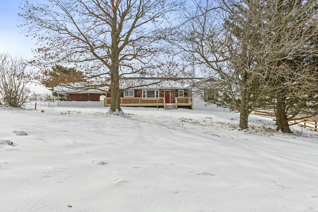 view of front of house with a deck