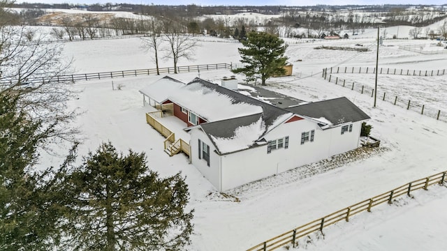 snowy aerial view with a rural view