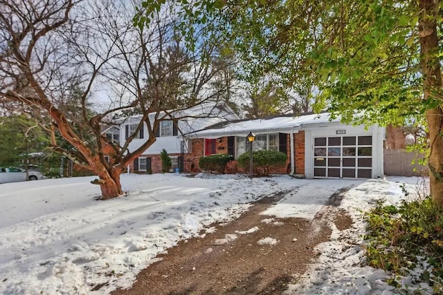 view of front of property featuring a garage