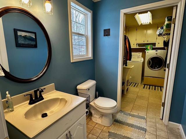 bathroom featuring tile patterned flooring, vanity, and toilet