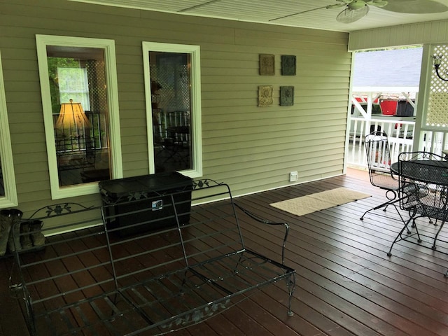 wooden terrace with ceiling fan