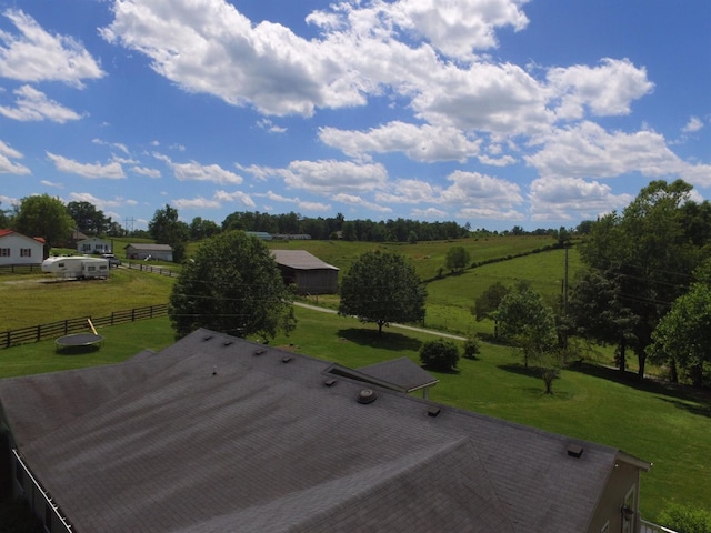 birds eye view of property featuring a rural view