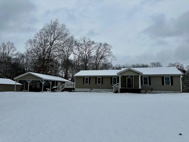 view of front facade featuring a carport