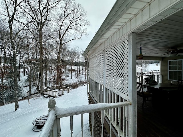 view of snow covered deck