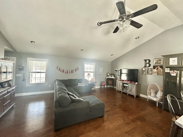 living room with vaulted ceiling, dark hardwood / wood-style floors, and ceiling fan