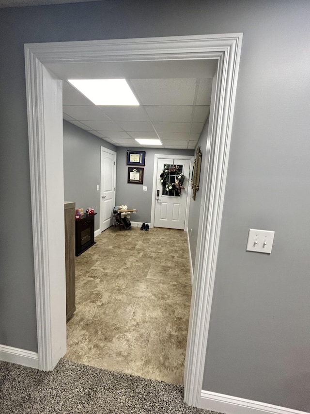 interior space featuring a paneled ceiling