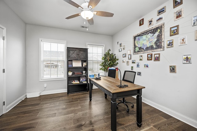 office with ceiling fan and dark hardwood / wood-style flooring