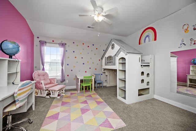 recreation room featuring vaulted ceiling, carpet, and ceiling fan