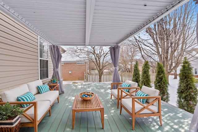 wooden deck with outdoor lounge area