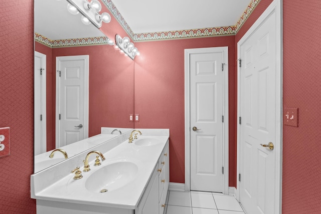 bathroom featuring tile patterned flooring and vanity