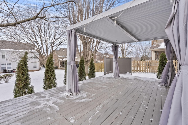 view of snow covered deck