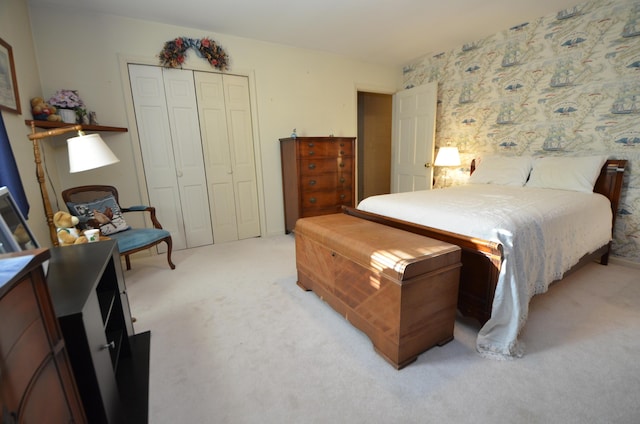 carpeted bedroom featuring a closet