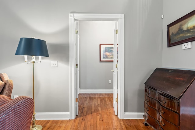 corridor featuring light hardwood / wood-style flooring