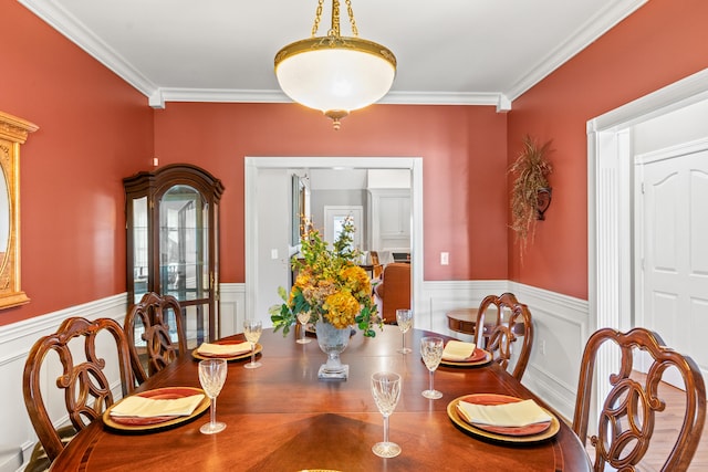2040 Indigo Dr, Richmond, KY 40475 - dining space featuring a wainscoted wall, crown molding, and a decorative wall