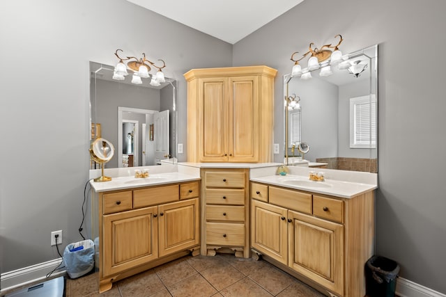 bathroom with vanity and tile patterned floors