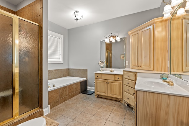 bathroom featuring vanity, separate shower and tub, and tile patterned flooring