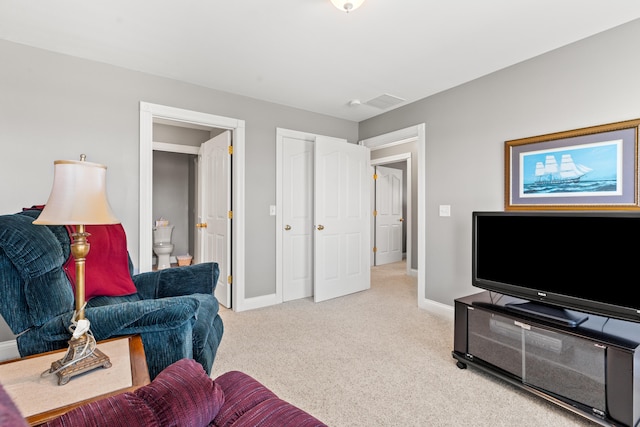 living room featuring light colored carpet