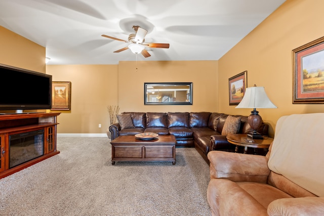 living room with carpet floors and ceiling fan