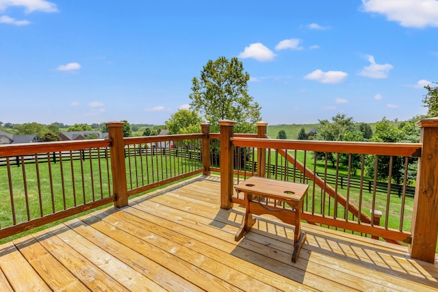 wooden deck with a yard