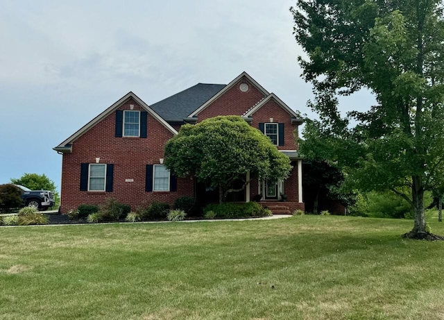 view of front of house with a front lawn