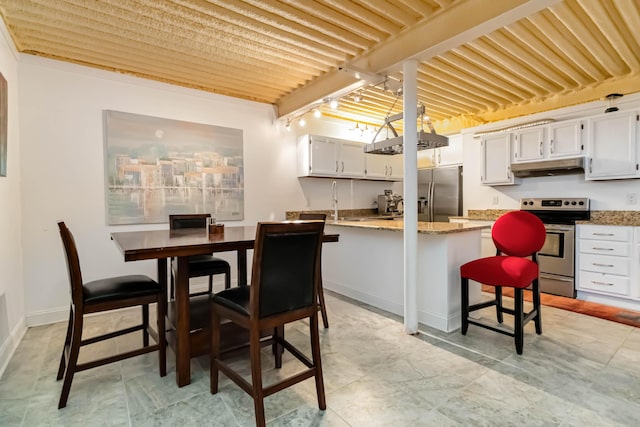 489 Sally J Rd, Mount Vernon, KY 40456 - dining room featuring rail lighting and baseboards
