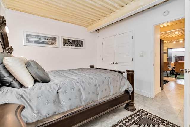 489 Sally J Rd, Mount Vernon, KY 40456 - bedroom featuring a closet, light marble finish flooring, and baseboards