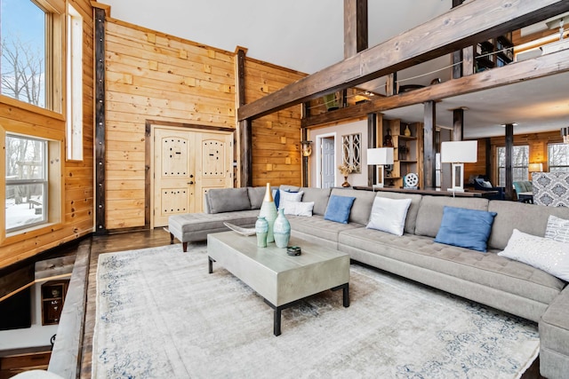 489 Sally J Rd, Mount Vernon, KY 40456 - living area with wood walls, wood finished floors, and a towering ceiling