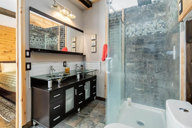 489 Sally J Rd, Mount Vernon, KY 40456 - bathroom featuring a stall shower, double vanity, decorative backsplash, and toilet