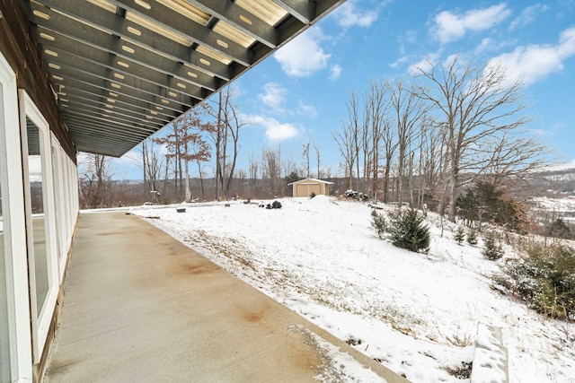 489 Sally J Rd, Mount Vernon, KY 40456 - yard layered in snow with a patio area