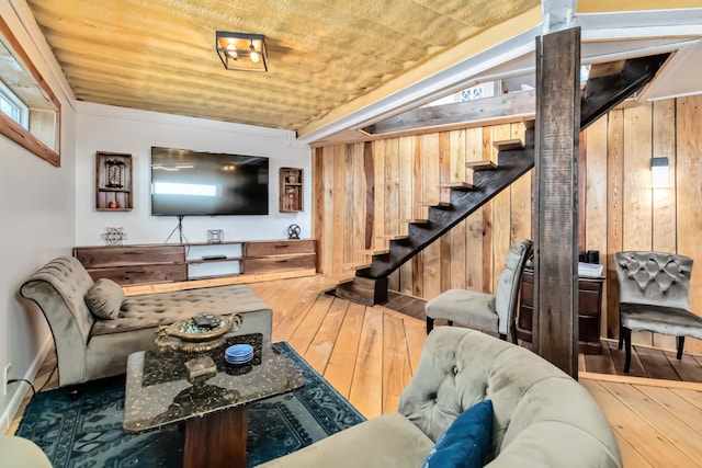 489 Sally J Rd, Mount Vernon, KY 40456 - living room featuring hardwood / wood-style floors, stairs, wooden walls, and wood ceiling