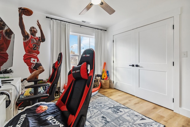 interior space featuring light hardwood / wood-style floors and ceiling fan