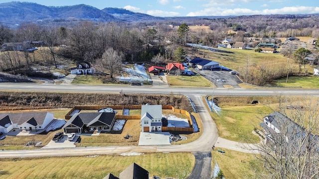 drone / aerial view featuring a mountain view